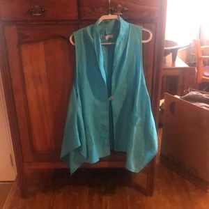 Ocean blue overtop. Pockets and asymmetrical. Light linen